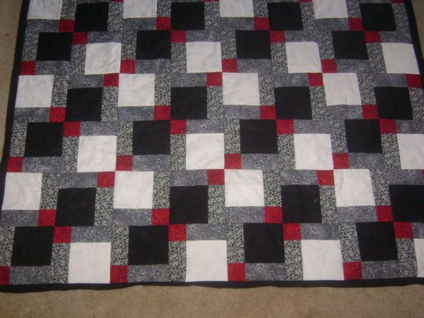 disappearing nine patch quilt pattern black white